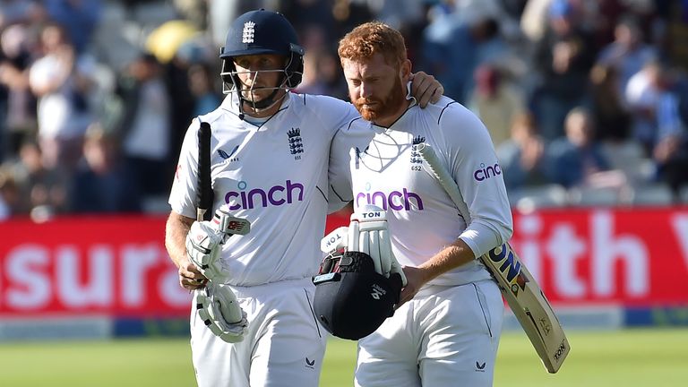 England's Joe Root walks off the field with batting partner Jonny Bairstow at the end of play on the fourth day of the fifth cricket test match between England and India at Edgbaston