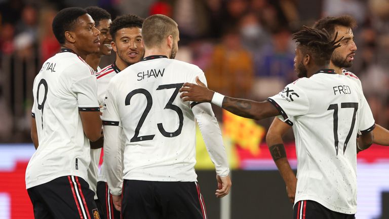 Jadon Sancho celebrates with Man Utd team-mates after scoring against Aston Vila