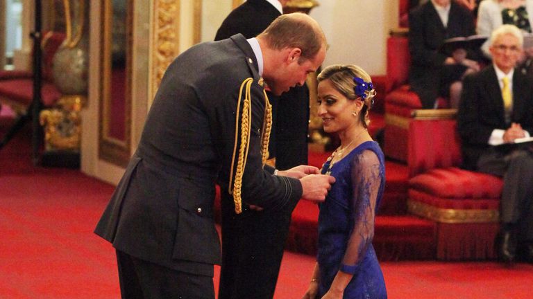 Miss Manisha Tailor is made an MBE (Member of the Order of the British Empire) by the Duke of Cambridge during an Investiture ceremony at Buckingham Palace.