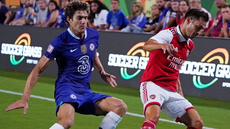 Arsenal's Cedric Soares, right, gets control of the ball in front of Chelsea's Marcos Alonso during the second half of a Florida Cup friendly soccer match Saturday, July 23, 2022, in Orlando, Fla. (AP Photo/John Raoux)
