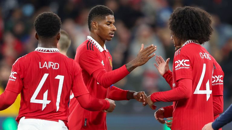 Marcus Rashford is congratulated by team-mates after scoring Man Utd's third goal (AP)