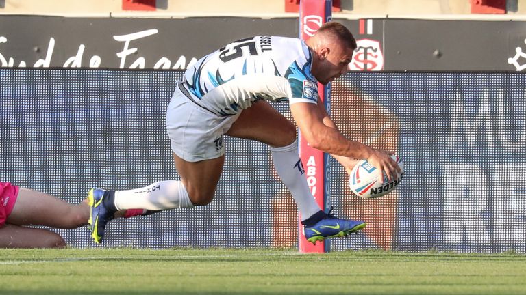 Picture by Manuel Blondeau/SWpix.com - 16/07/2022 - Rugby League Round 19 - Betfred Super League - Toulouse Olympique v Leeds Rhinos - Stade Ernest-Wallon, Toulouse, France - Matty Russell of Toulouse Olympique scores a try