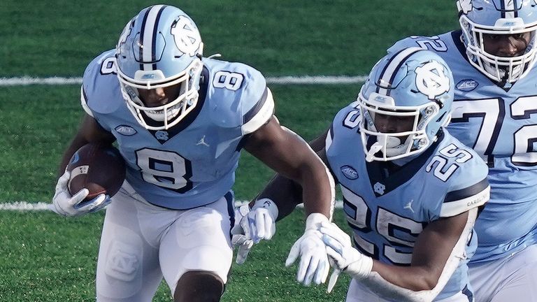 Michael Carter and Javonte Williams in action at North Carolina