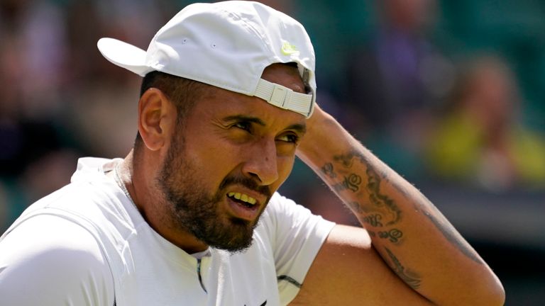 Australia's Nick Kyrgios pauses as he plays Brandon Nakashima of the US in a men's singles fourth round match on day eight of the Wimbledon tennis championships in London, Monday, July 4, 2022. (AP Photo/Alberto Pezzali)