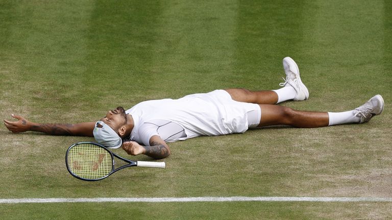 An emotional Kyrgios lay on the floor after sealing victory