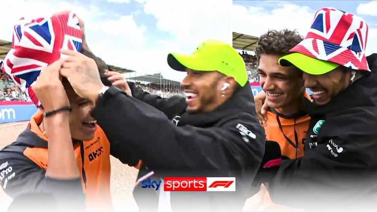Lewis Hamilton jokingly steals Lando Norris' Union Jack inspired bucket hat during the drivers parade for the British Grand Prix!  