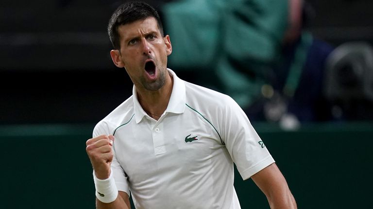 Novak Djokovic celebrates a break of serve in the forth set during the third set in his Gentlemen's Singles fourth round match against Tim van Rijthoven during day seven of the 2022 Wimbledon Championships at the All England Lawn Tennis and Croquet Club, Wimbledon
