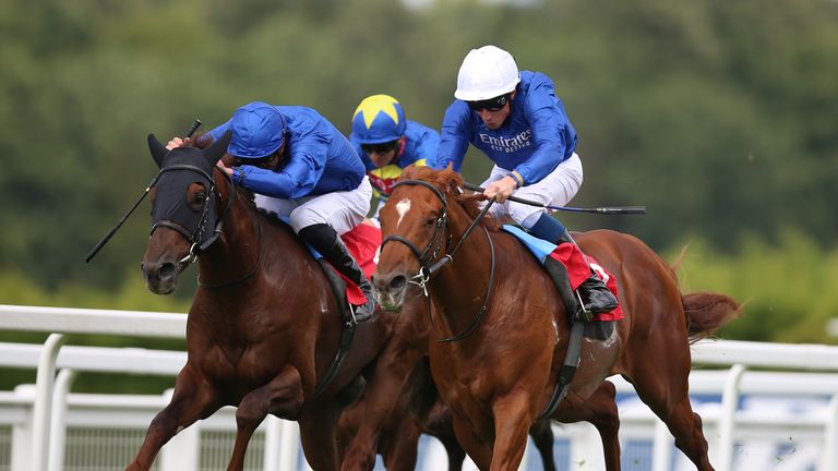 William Buick and One Nation (white cap) win at Sandown