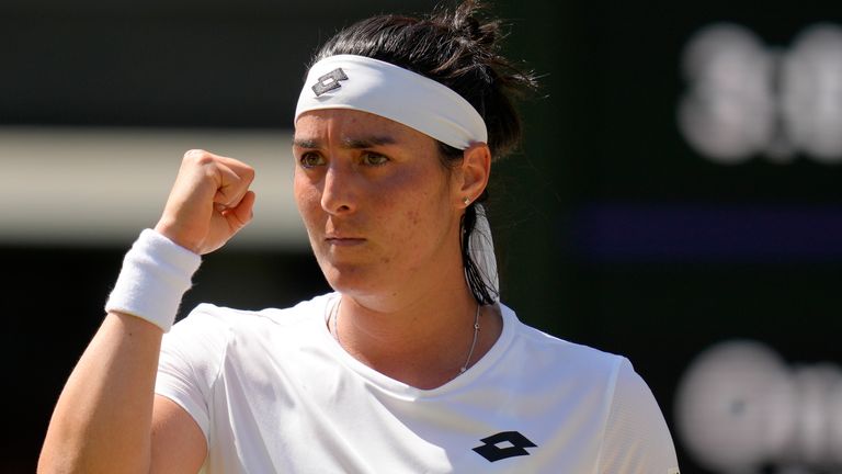 Tunisia&#39;s Ons Jabeur celebrates winning a point against Germany&#39;s Tatjana Maria in a women&#39;s singles semifinal match on day eleven of the Wimbledon tennis championships in London, Thursday, July 7, 2022. (AP Photo/Kirsty Wigglesworth)