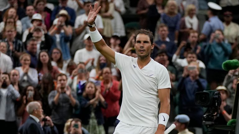 Spain's Rafael Nadal celebrates defeating Italy's Lorenzo Sonego during a third round men's singles match on day six of the Wimbledon tennis championships in London, Saturday, July 2, 2022. (AP Photo/Alastair Grant)