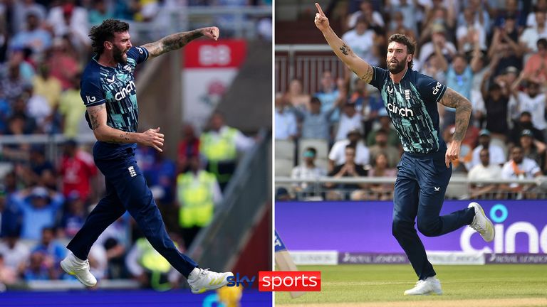 England&#39;s Reece Topley, right, celebrates after dismissing India&#39;s Rohit Sharma