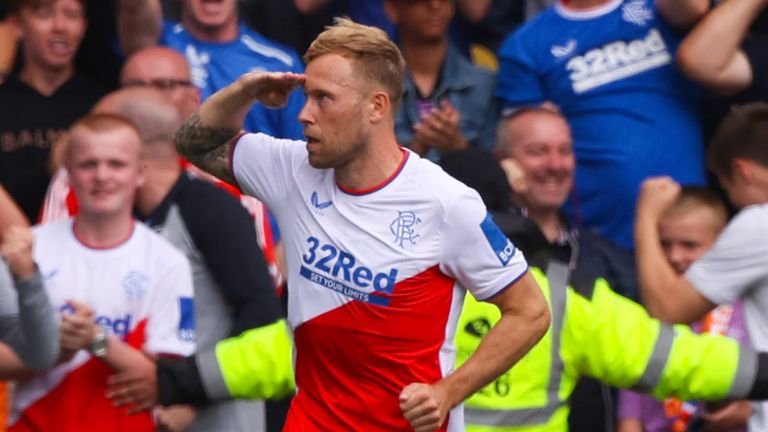 Scott Arfield salutes the fans after equalising for Rangers