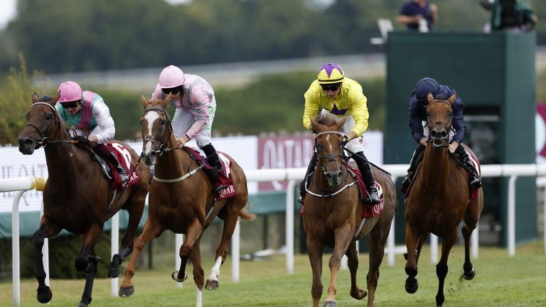 Sea La Rosa (yellow) reels in long-time leader Urban Artist to win the Group Two Lillie Langtry Stakes at Goodwood