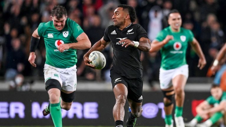 New Zealand&#39;s Sevu Reece runs from the defense to score a try during the rugby international between the All Blacks and Ireland at Eden Park in Auckland, New Zealand, Saturday, July 2, 2022.