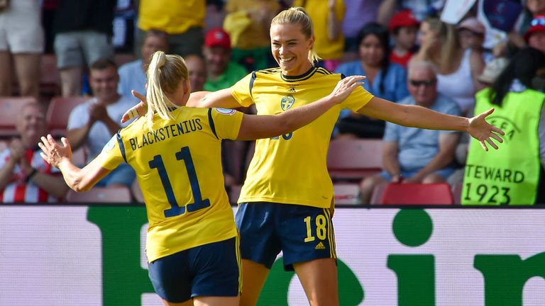 Sweden&#39;s Fridolina Rolfo celebrates with teammate Stina Blackstenius 