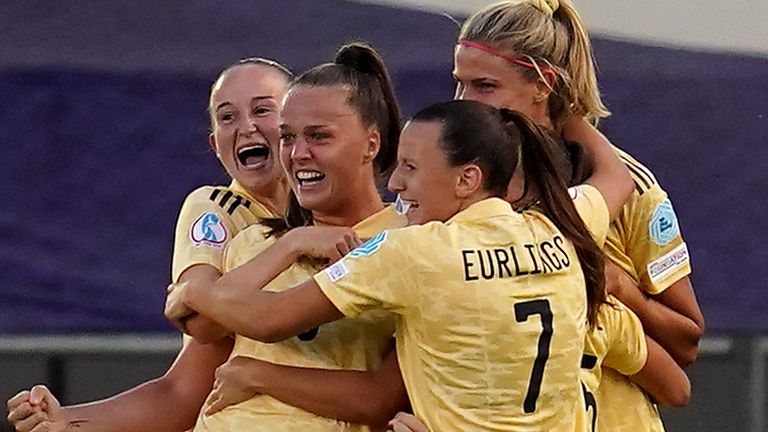 Belgium's Tine De Caigny (No. 6) celebrates scoring the first goal for their side against teammates during the UEFA Women's Euro 2022 Group D match at Manchester City Academy Stadium, Manchester.  Shooting date: Monday, July 18, 2022