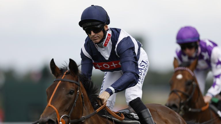 Pat Dobbs eases Trillium down after victory in the Molecomb at Goodwood