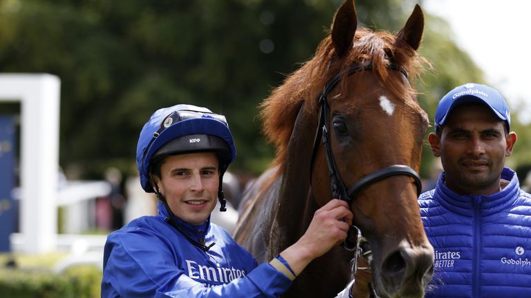 William Buick poses with Secret State after success at the Goodwood Festival