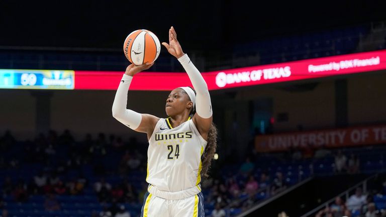 Dallas Wings guard Arike Ogunbowale (24) shoots during the second half of a WNBA basketball game against the Connecticut Sun in Arlington, Texas, Tuesday, July 5, 2022. The Wings won 82-71.