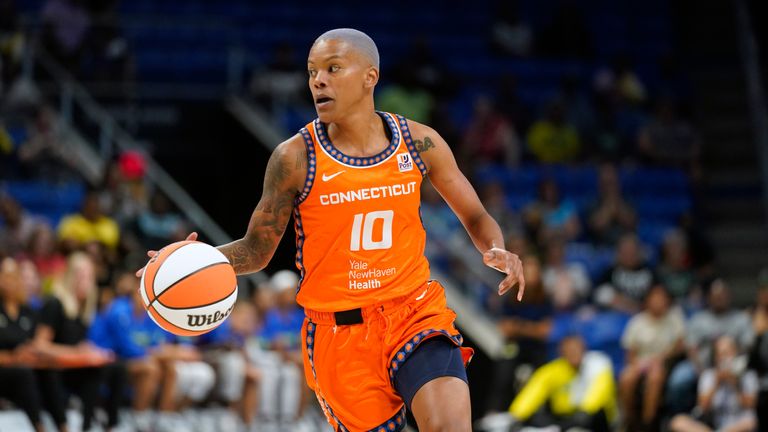 Connecticut Sun guard Courtney Williams dribbles during the first half of a WNBA basketball game against the Dallas Wings in Arlington, Texas, Tuesday, July 5, 2022. 