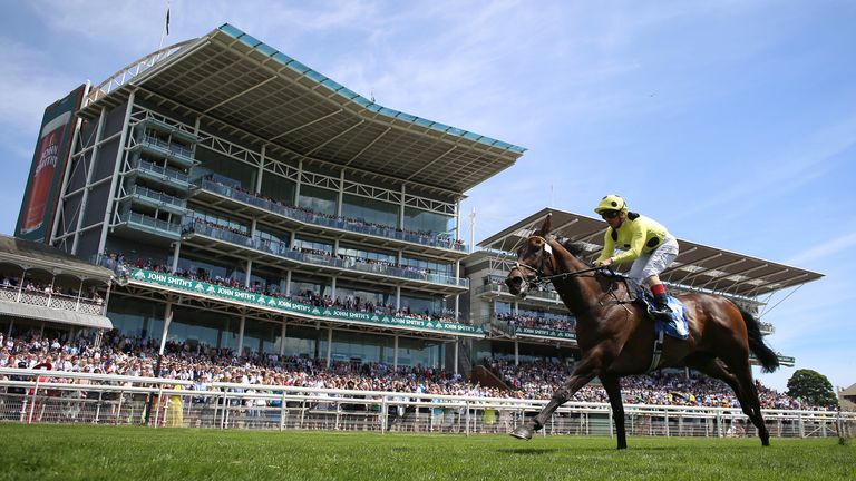 Without A Fight ridden by Andrea Atzeni wins The Johns Smith...s Silver Cup Stakes during John Smith's Cup Day at York racecourse. Picture date: Saturday July 9, 2022.