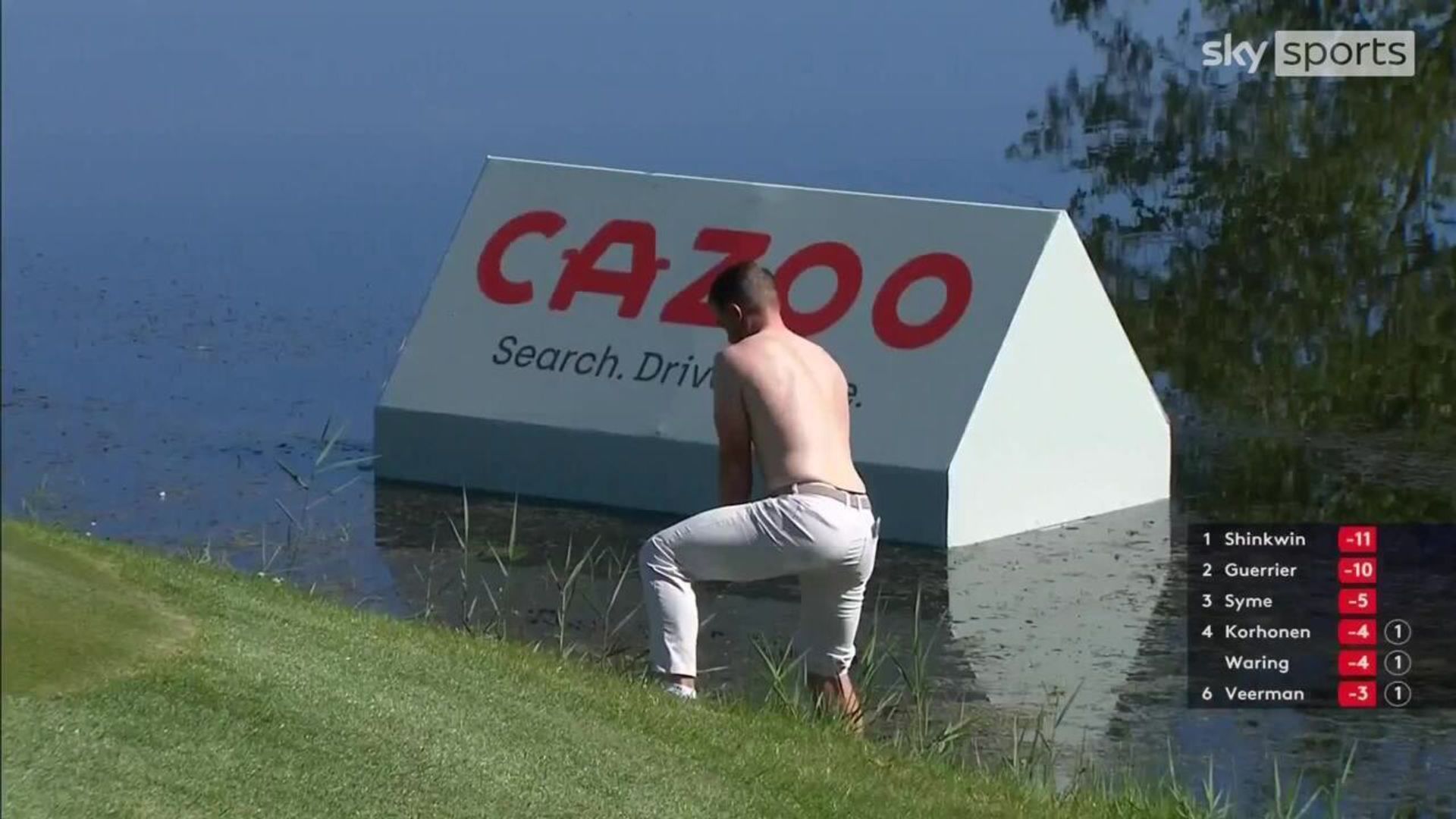 Dunne plays shirtless from the water!