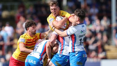 Catalans Dragons' Corentin Le Cam collides with Jacob Miller and Jordan Crowther