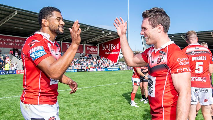 Picture by Allan McKenzie/SWpix.com - 31/07/2022 - Rugby League - Betfred Super League Round 21 - Salford Red Devils v St Helens - AJ Bell Stadium, Salford, England - Salford's Kallum Watkins & Brodie Croft celebrate after victory over St Helens.
