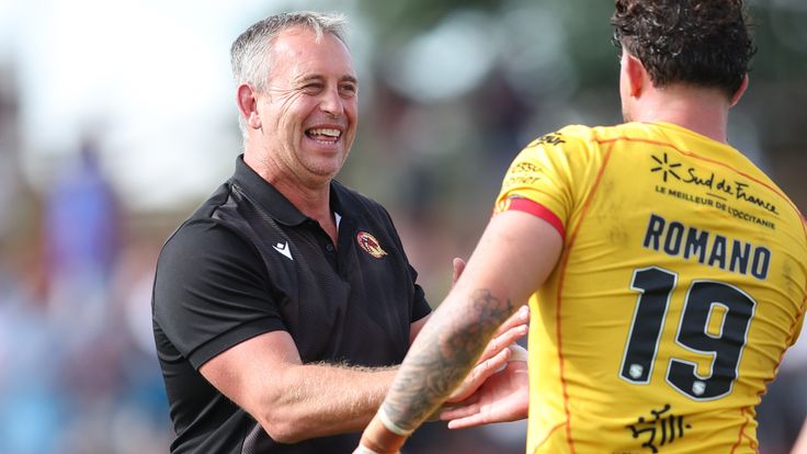 Picture by John Clifton/SWpix.com - 07/08/2022 - Rugby League - Betfred Super League Round 22 - Wakefield Trinity v Catalans Dragons - Be Well Support Stadium, Wakefield, England -
Catalans Dragons' head coach Steve McNamara celebrates with Arthur Romano at the end of the match
