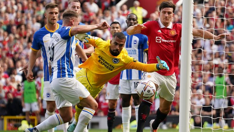 Brighton&#39;s Alexis Mac Allister scores an own goal during the match against Manchester United