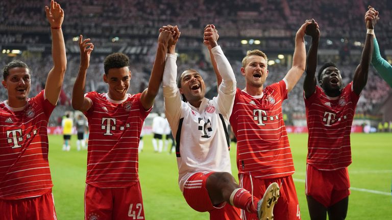 Bayern's team players celebrate as they won the German Bundesliga soccer match between Eintracht Frankfurt and Bayern Munich in Frankfurt, Germany, Friday, Aug. 5, 2022. (AP Photo/Matthias Schrader)