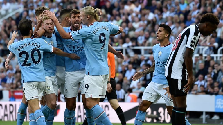 Manchester City's Bernardo Silva celebrates with teammates after scoring his sides third goal (AP)