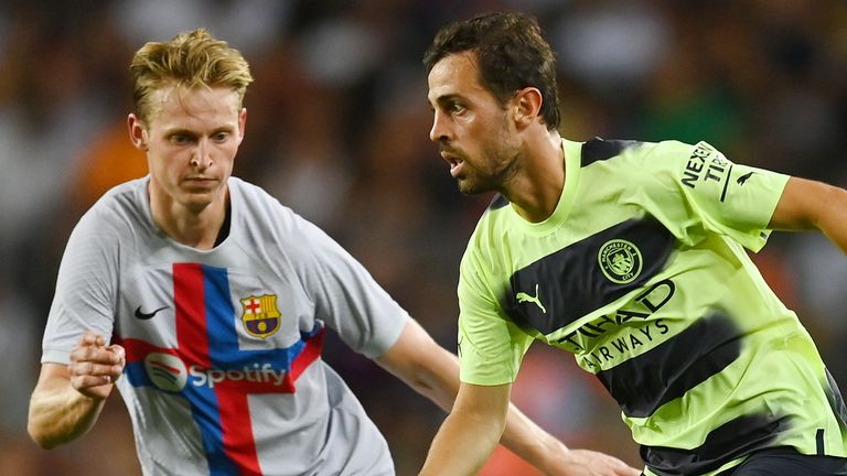 Man City's Bernardo Silva (right) in action with Barcelona's Frenkie de Jong during the charity game