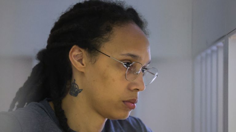 WNBA star and two-time Olympic gold medalist Brittney Griner stands listening to a verdict in a courtroom in Khimki just outside Moscow, Russia, Thursday, Aug. 4, 2022. American basketball star Brittney Griner apologized to her family and teams as a Russian court heard closing arguments in her drug possession trial said it expected to deliver a verdict later Thursday. (Evgenia Novozhenina/Pool Photo via AP)