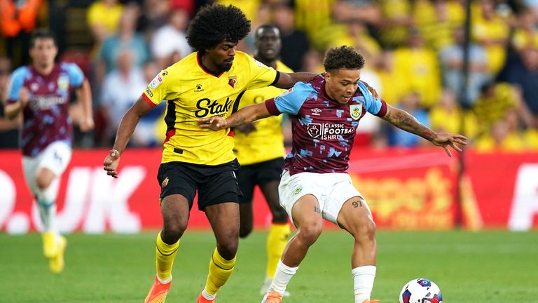 Watford&#39;s Hamza Choudhury and Burnley&#39;s Manuel Benson battle for the ball