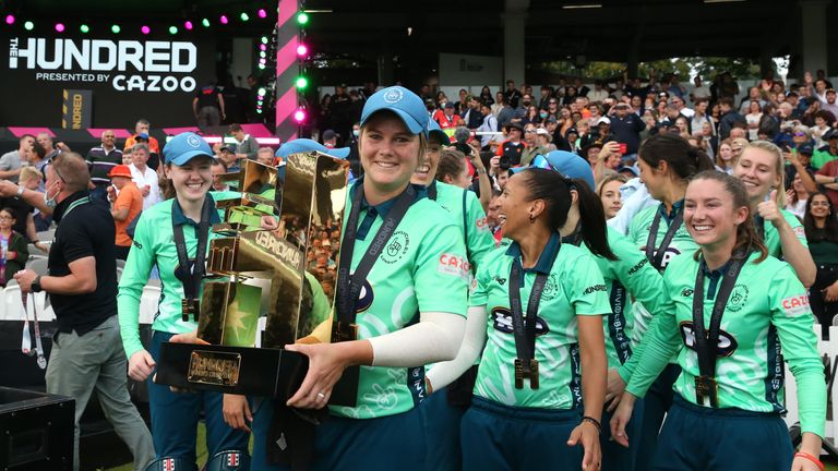 Oval Invincibles&#39; Dane van Niekerk lifts the inaugural Hundred trophy after the Women&#39;s Final of The Hundred at Lord&#39;s, London.