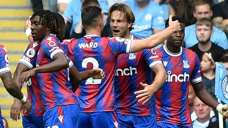 Joachim Andersen is mobbed after doubling Crystal Palace's lead against Man City
