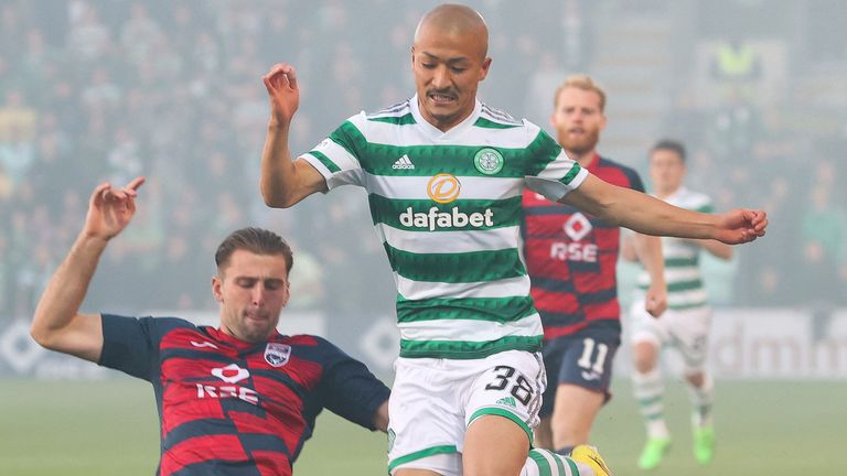 Ross County&#39;s Ben Purrington tackles Celtic&#39;s Daizen Maeda during a Premier Sports Cup