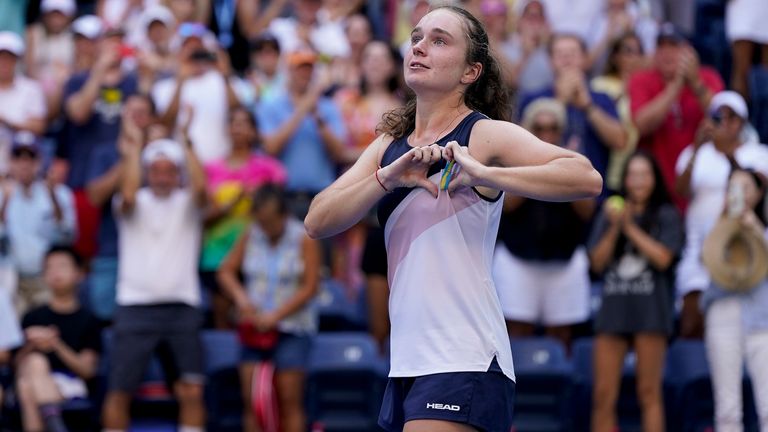 Daria Snigur, of Ukraine, reacts after upsetting Simona Halep, of Romania, during the first round of the US Open tennis championships, Monday, Aug. 29, 2022, in New York. (AP Photo/Seth Wenig)