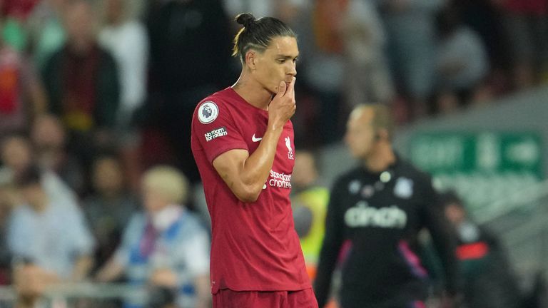 Liverpool's Darwin Nunez walks off the field after being shown a red card 