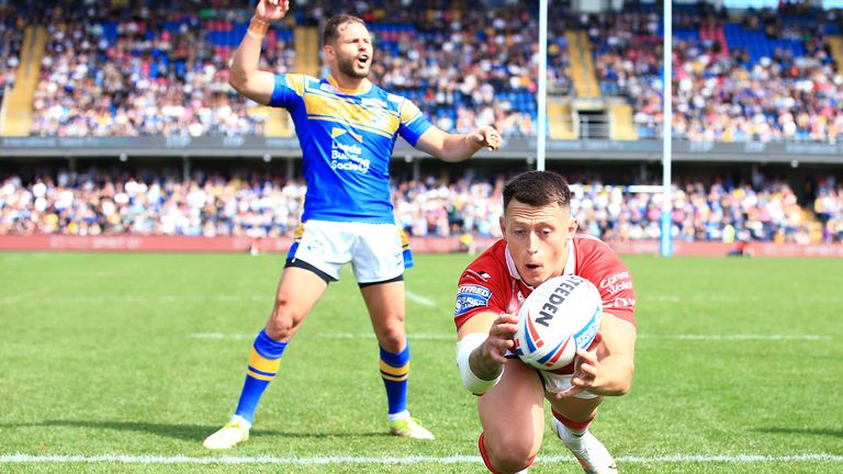 Deon Cross of Salford Red Devils reaches for a try that will be disallowed. (Photo: Matt West/SWpix.com)