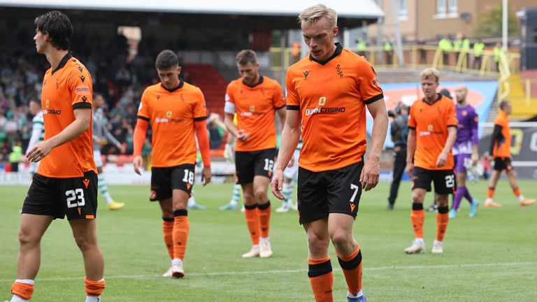 Dundee United players looks dejected in their 9-0 loss to Celtic