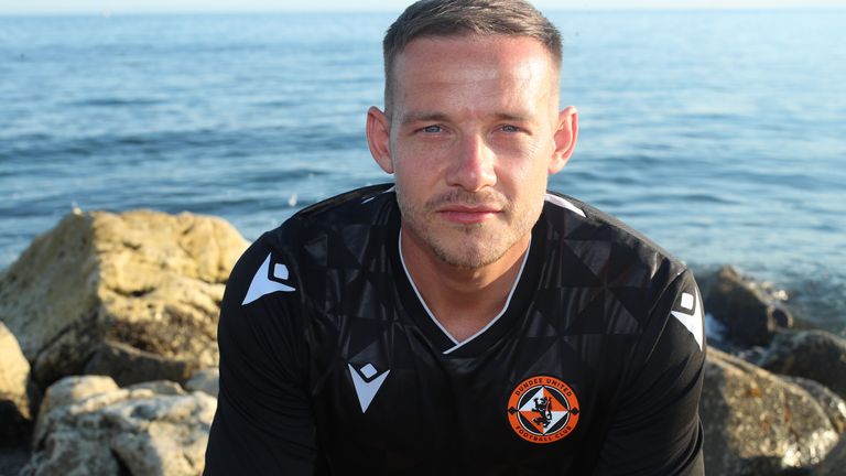 Dundee United's away kit features a new-look club crest