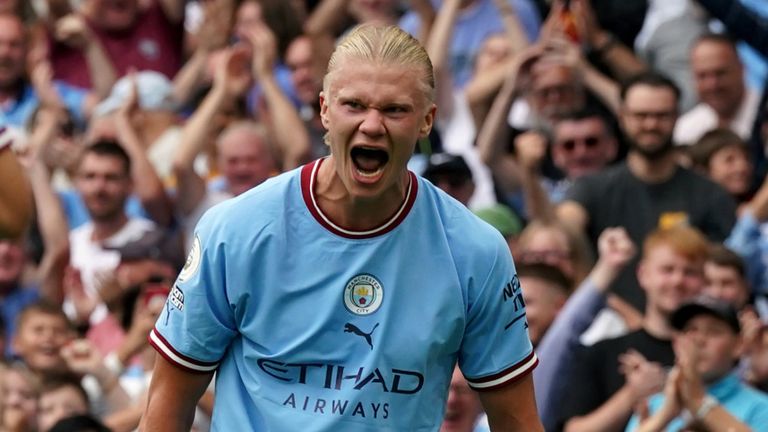 Erling Haaland roars in celebration after completing his hat-trick