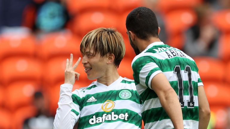 Celtic&#39;s Kyogo Furuhashi (left) celebrates scoring their side&#39;s third goal of the game, completing a hat-trick during the cinch Premiership match at Tannadice Park, Dundee. Picture date: Sunday August 28, 2022.