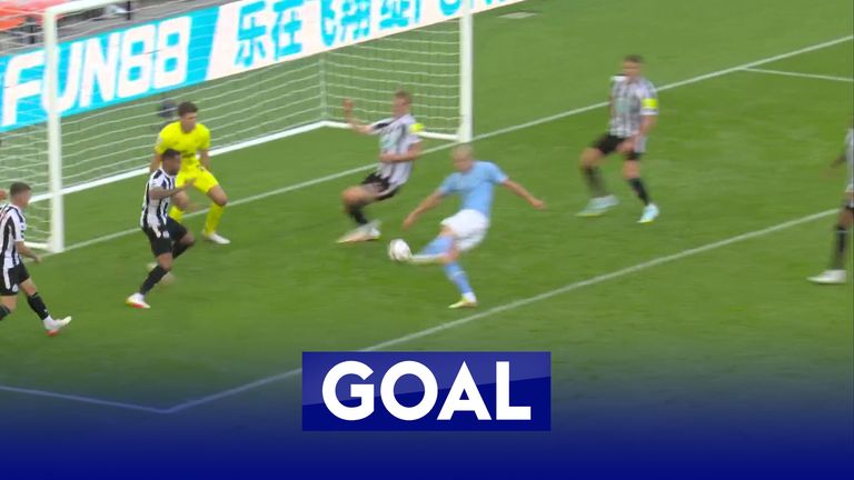 Erling Haaland finishes from close range to bring Manchester City back into the game.