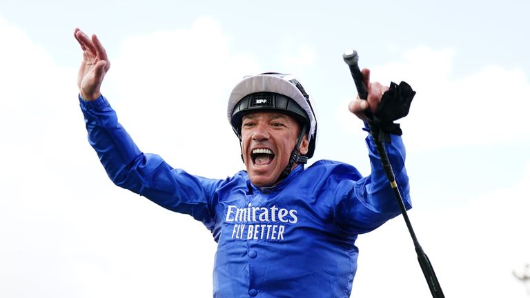 Frankie Dettori performs his famous flying dismount after victory in the Ebor on Trawlerman at York