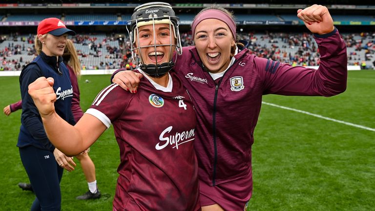 12 September 2021; Galway players Dervla Higgins, left, and Lisa Casserly celebrate after their side's victory in the All-Ireland Senior Camogie Championship Final match between Cork and Galway at Croke Park in Dublin. Photo by Piaras .. M..dheach/Sportsfile