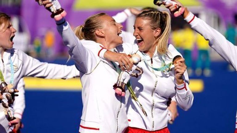 England's Hannah Martin (left) and Lily Owsley celebrate with their gold medals after winning the Women's Gold Medal Hockey match against Australia at the University of Birmingham Hockey and Squash Centre on day ten of the 2022 Commonwealth Games in Birmingham. Picture date: Sunday August 7, 2022.