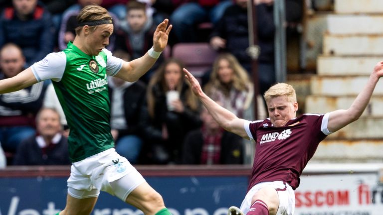 EDINBURGH, SCOTLAND - APRIL 09: Elias Melkersen and Alex Cochrane in action during a cinch Premiership match between Hearts and Hibs at Tynecastle, on April 09, 2022, in Edinburgh, Scotland. (Photo by Alan Harvey / SNS Group)